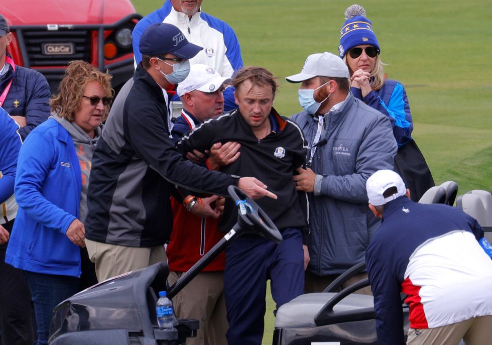 Actor Tom Felton receives medical attention during a practice round