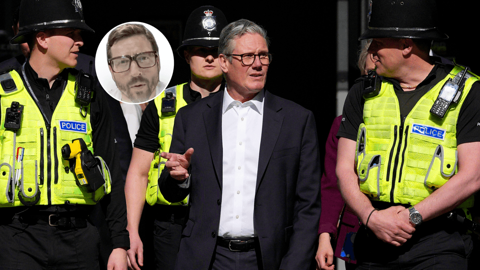 Adam Brooks (left), police walking with Keir Starmer