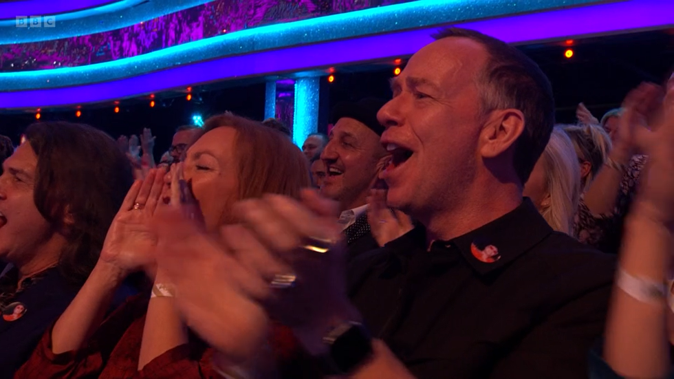Adam Woodyatt and Tanya Franks cheer on Borthwick