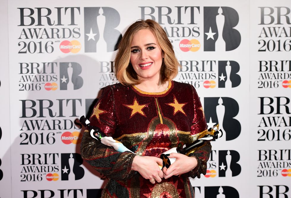 Adele with the BRIT Awards for Best British Female, Best British Album, Best British Single and Global Success Award in the press room at the 2016 Brit Awards at the O2 Arena, London. PRESS ASSOCIATION Photo. Picture date: Wednesday February 24, 2016. See PA story SHOWBIZ Brits. Photo credit should read: Ian West/PA Wire