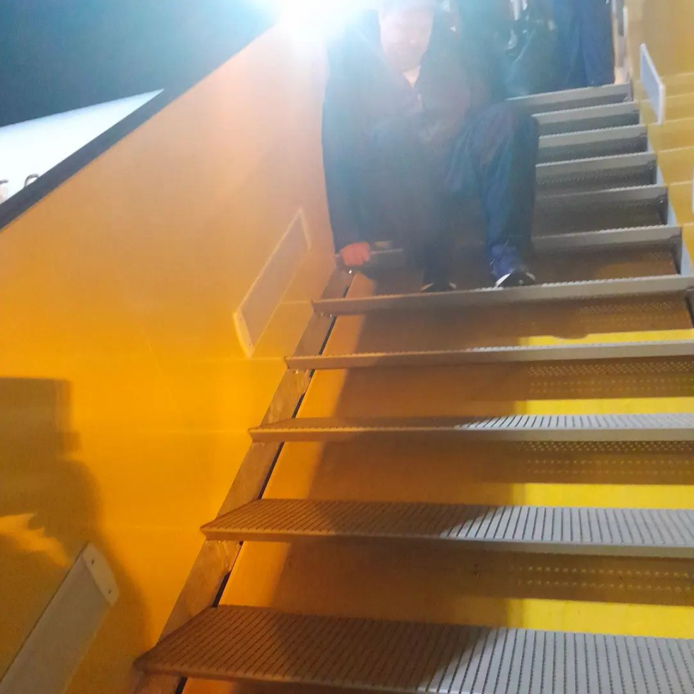 Adrian Keogh on the steps outside a Ryanair plan