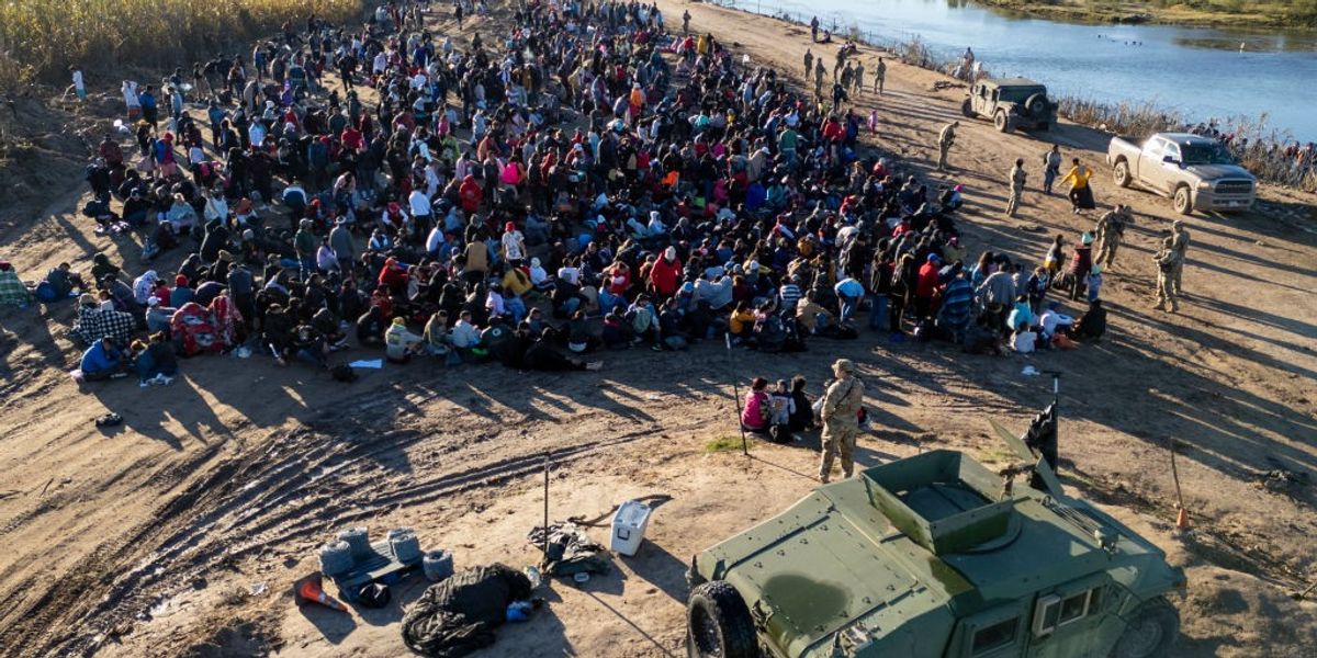 NextImg:US suspends train crossings at southern border as migrant crisis continues to escalate