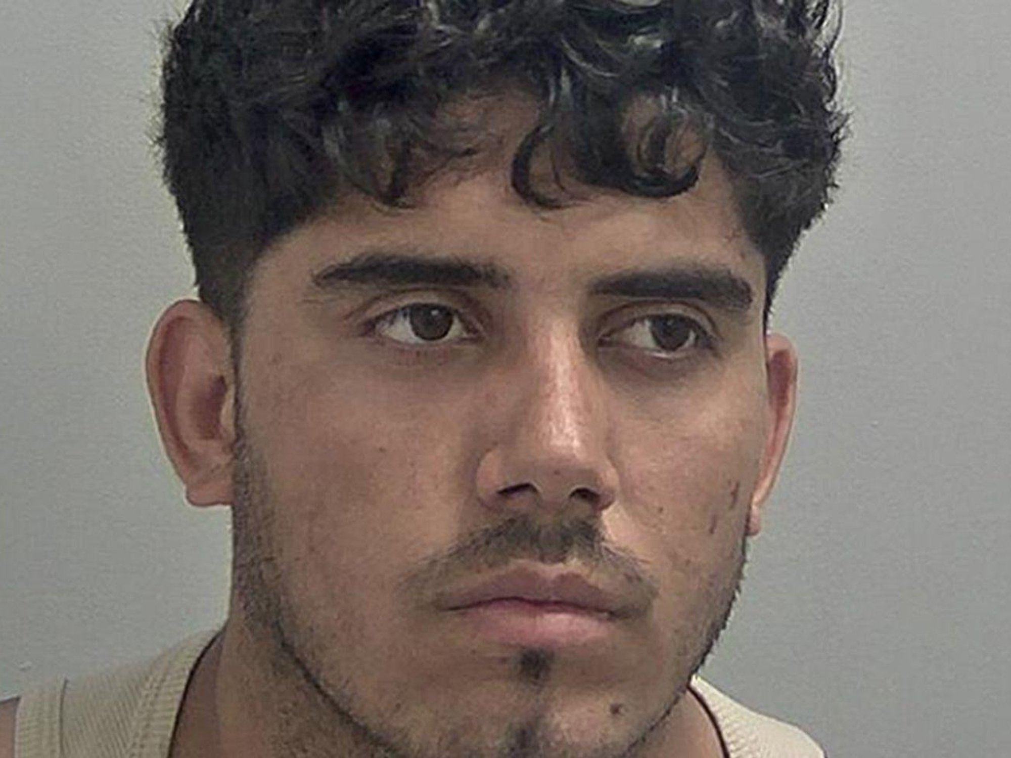 Afghan national Ahmad Mulakhil,