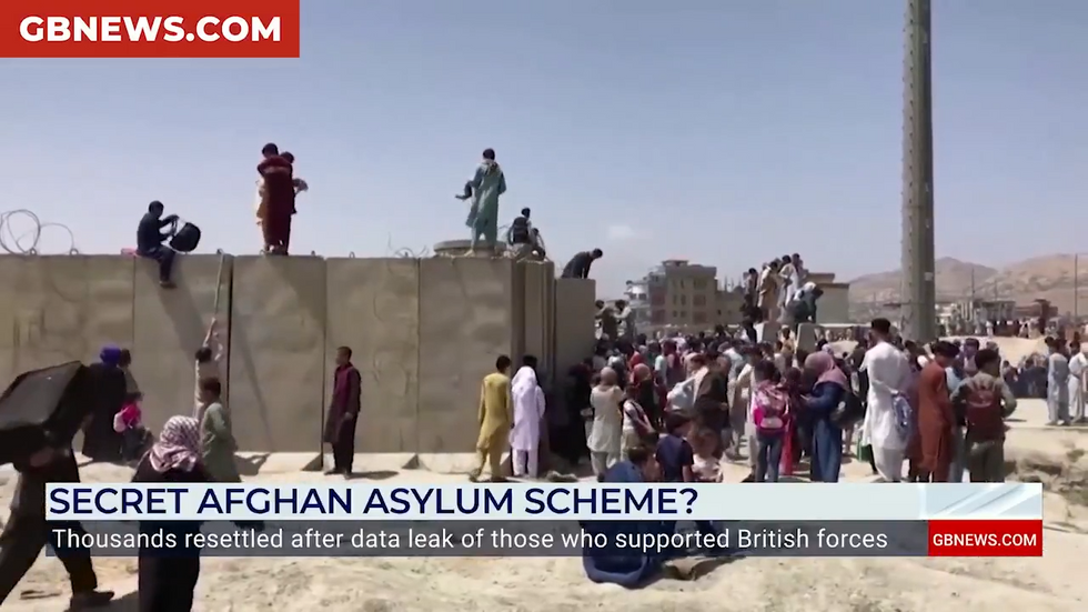 Afghans during a mass evacuation