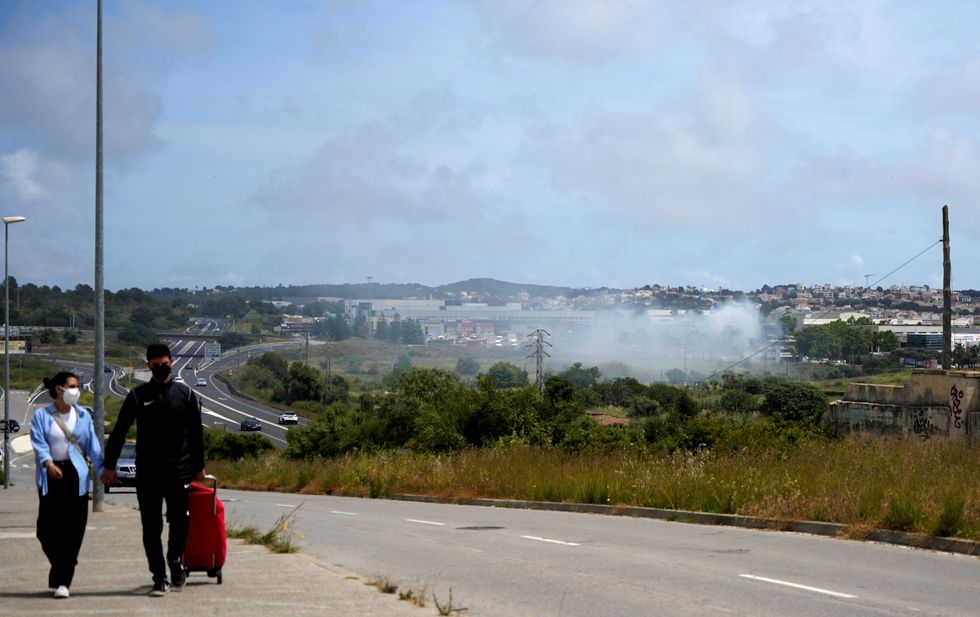 Aftermath of industrial warehouse fire in Catalonia