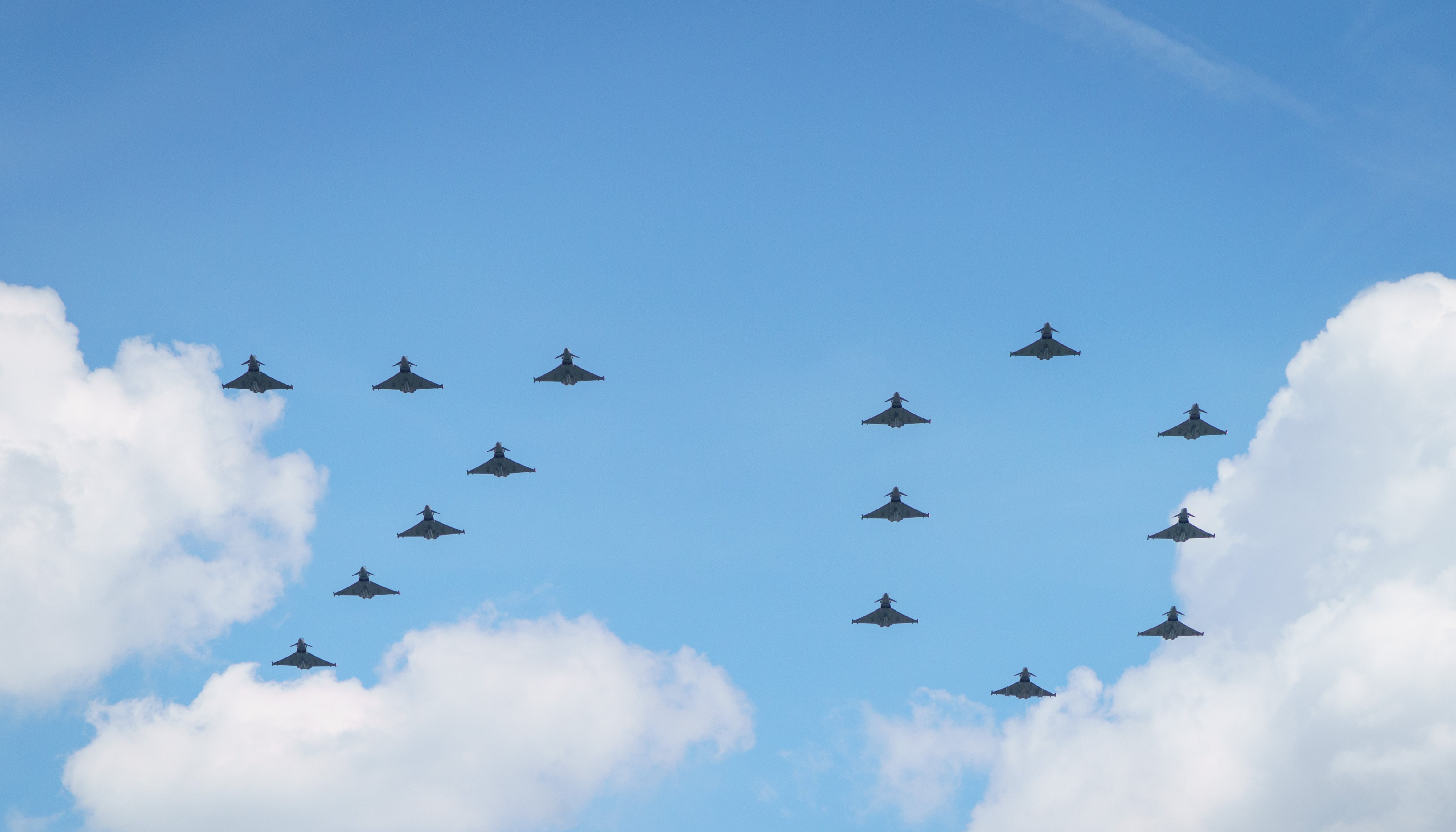 Aircraft spell out '70' during a flypast at the conclusion of the Trooping the Colour ceremony at Horse Guards Parade