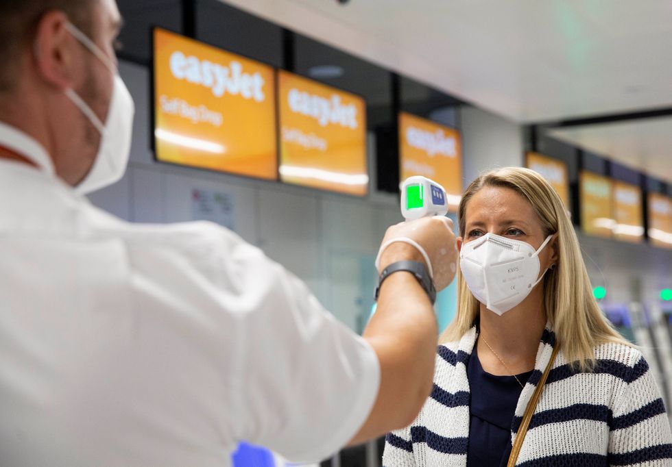 Airport staff and passengers have had to adhere to covid restricting measures.