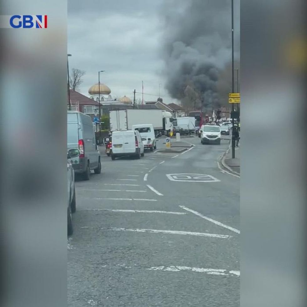 Fire near Heathrow Airport adds to travel chaos as eight fire engines and 60 firefighters rush to scene