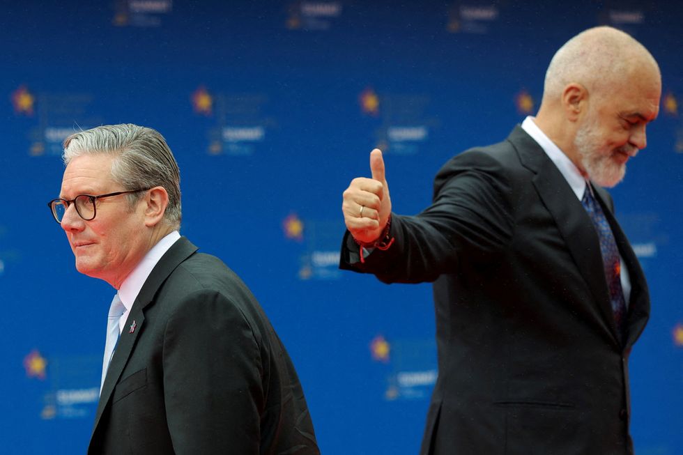 Albania's Prime Minister Edi Rama gestures as he welcomes Britain's Prime Minister Keir Starmer \u200b