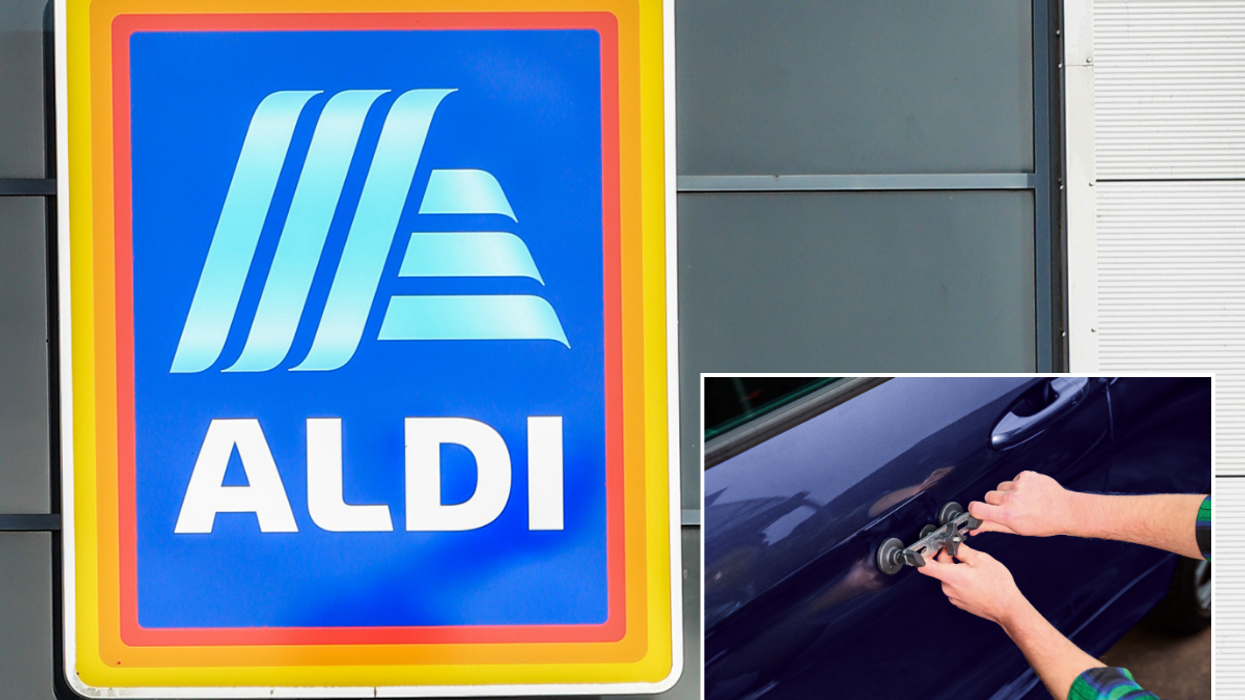 Aldi / person fixing car