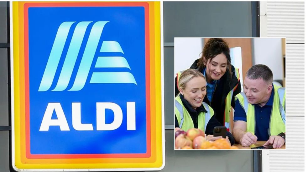 ALDI sign alongside ALDI workers