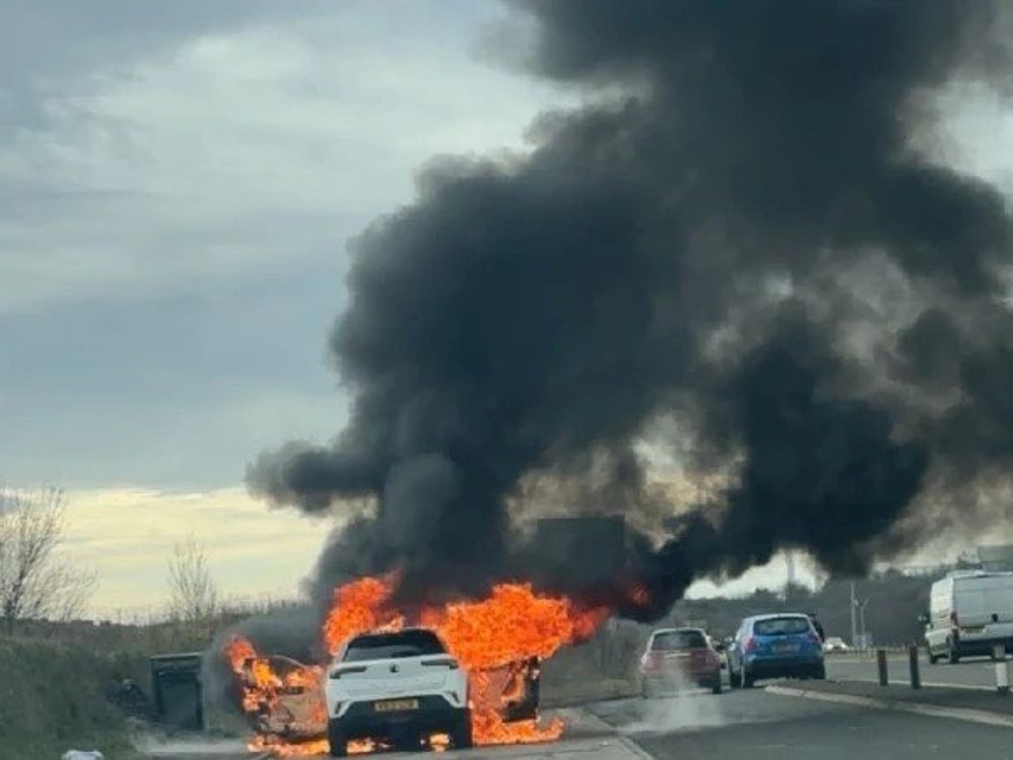 Alex McClean's car on fire