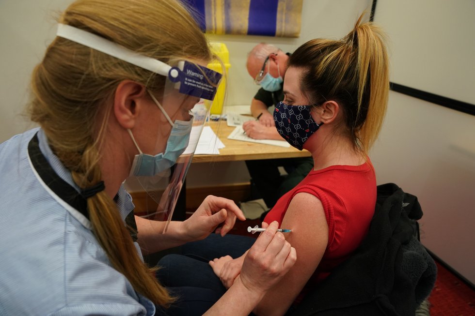 Alex Morton, 27, from Cramlington receiving her Covid-19 vaccine along with other health and social care workers at the Life Science Centre International Centre for Life in Newcastle.