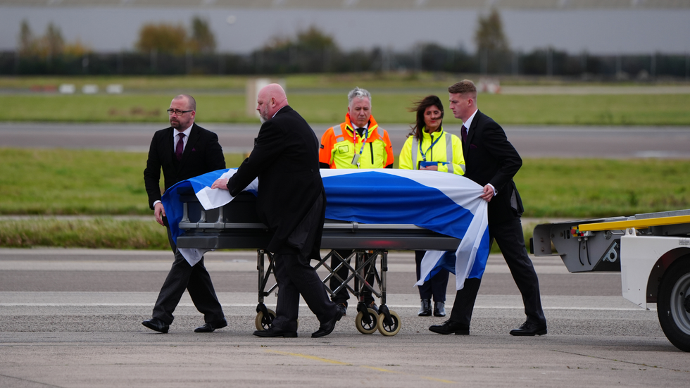 Alex Salmond's coffin at Aberdeen Airport