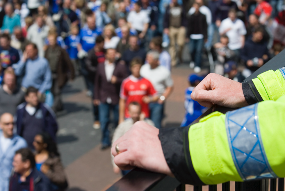 Alex Story (left), police officer (right)