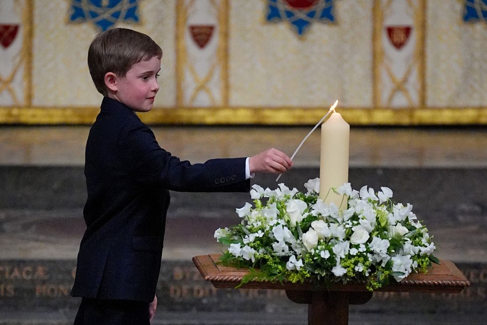 Alexander Churchill lights the Candle of Peace