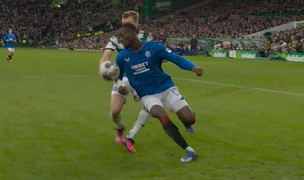Alistair Johnston knocked the ball out of play with his hand
