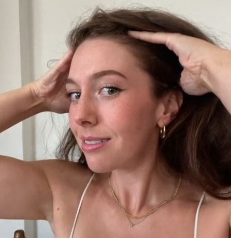 ALLY massaging her scalp
