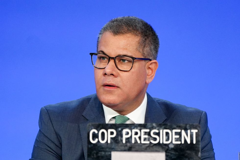 Alok Sharma President of the Cop26 climate summit takes part in a plenary session during the official final scheduled day of the Cop26 summit in Glasgow yesterday.