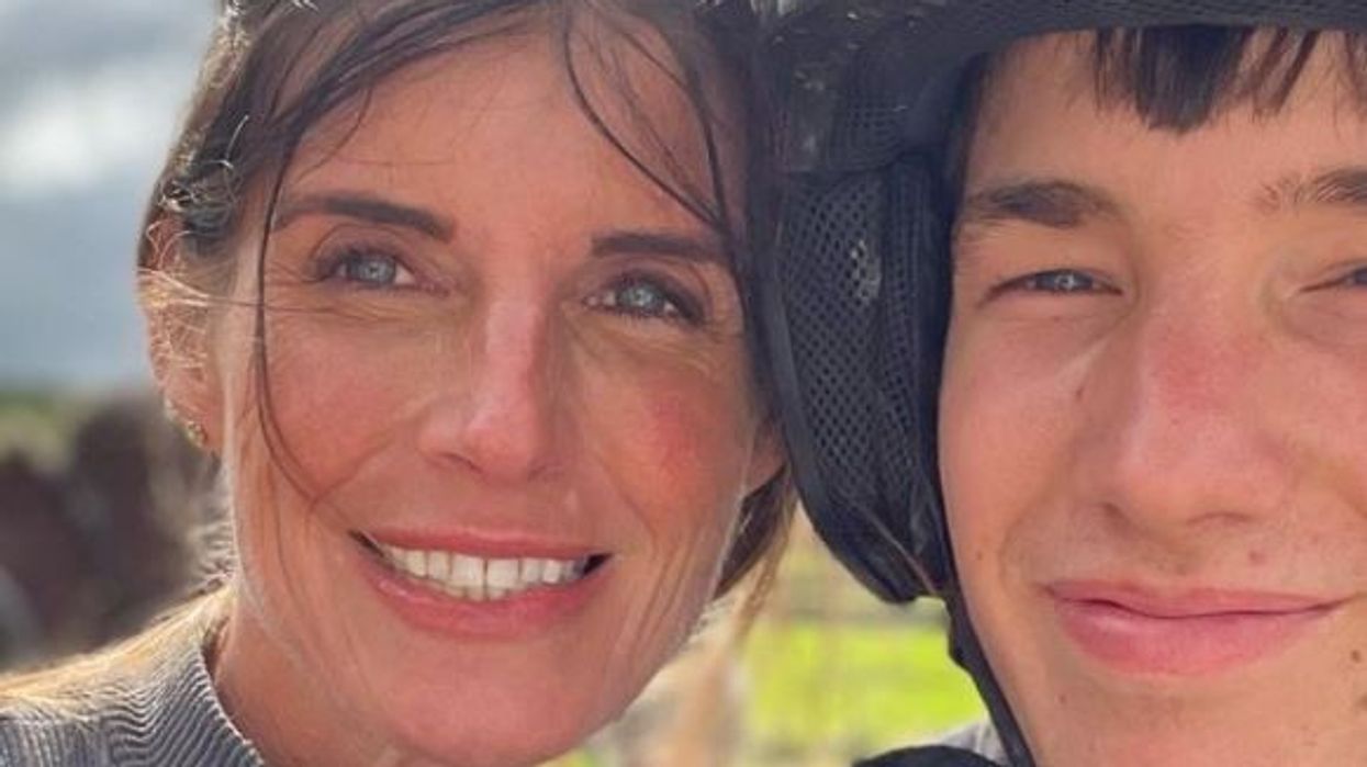 Amanda Owen smiles with son Reuben