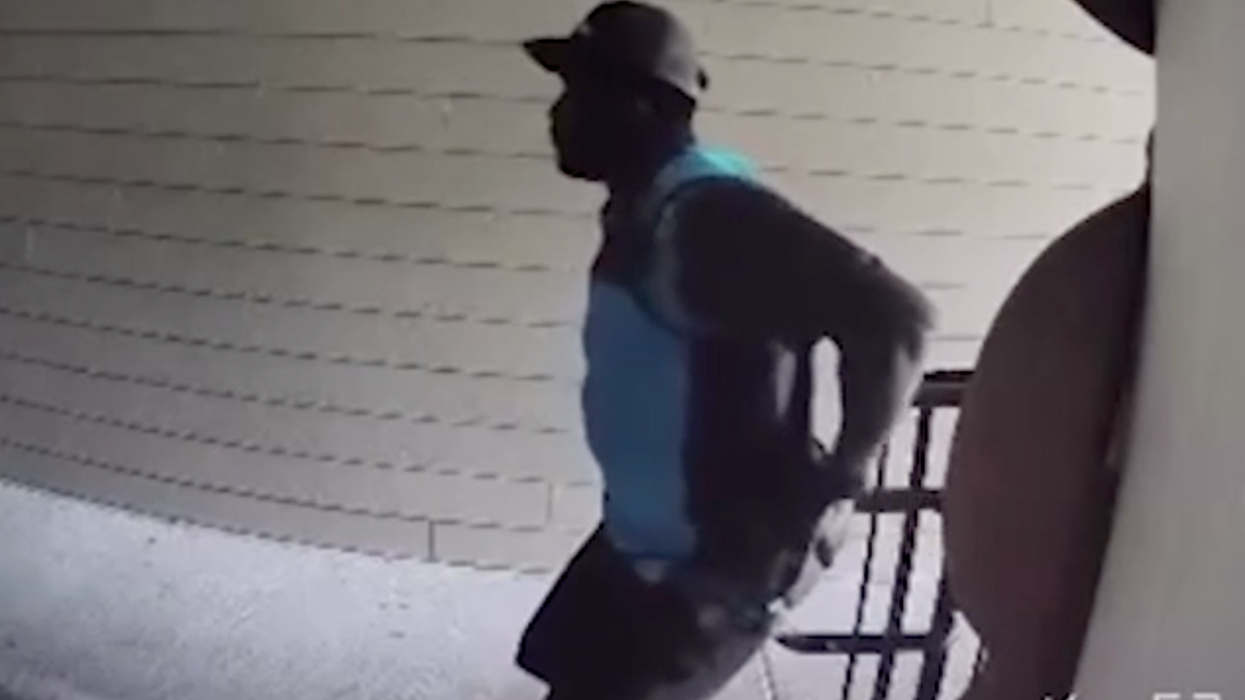Amazon delivery driver wiping his bottom on a railing
