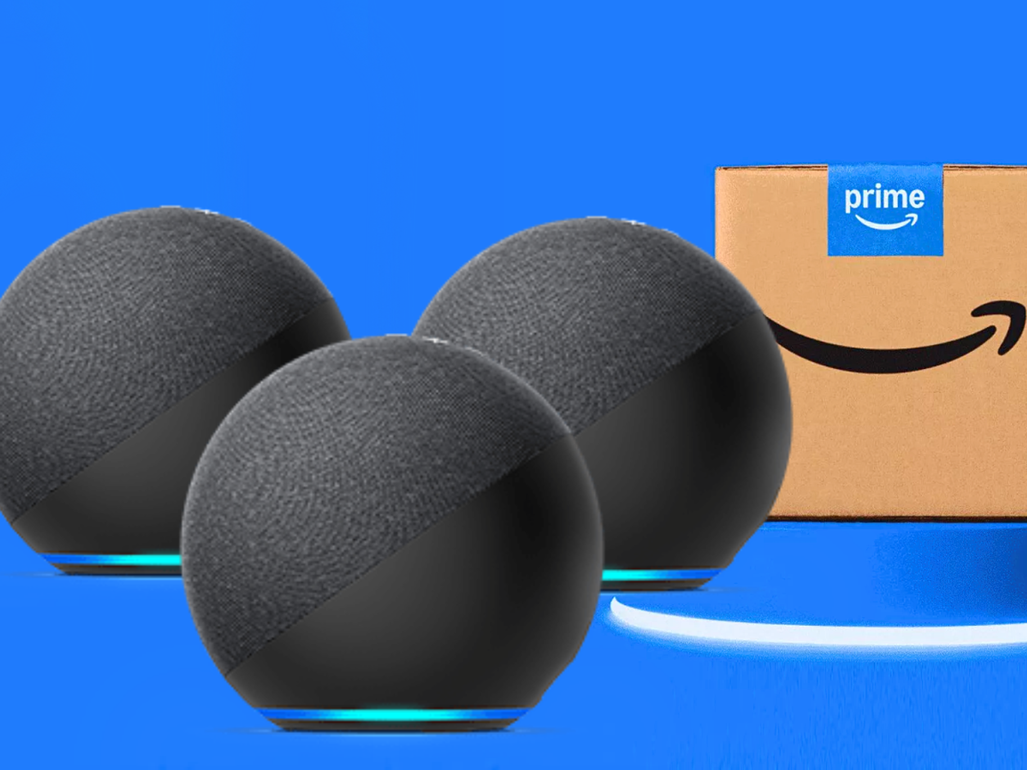 Amazon Echo Dots next to Amazon Prime shipping box