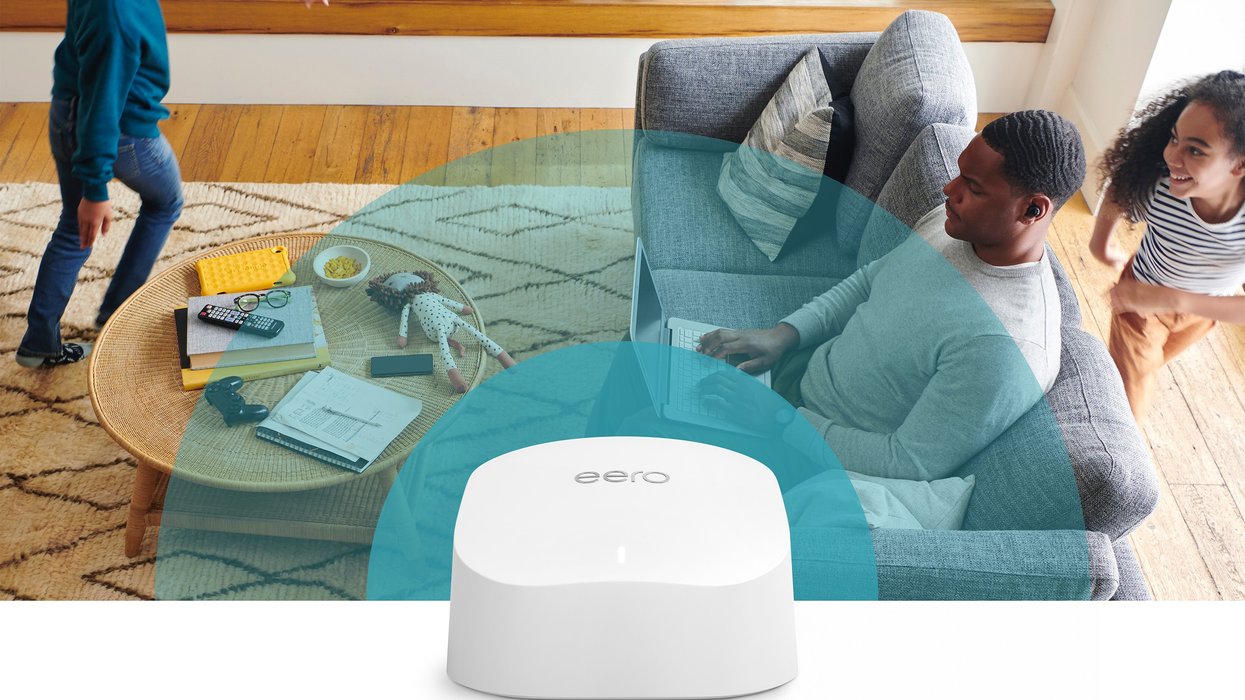 amazon eero 6 router with a family running and laughing in the background