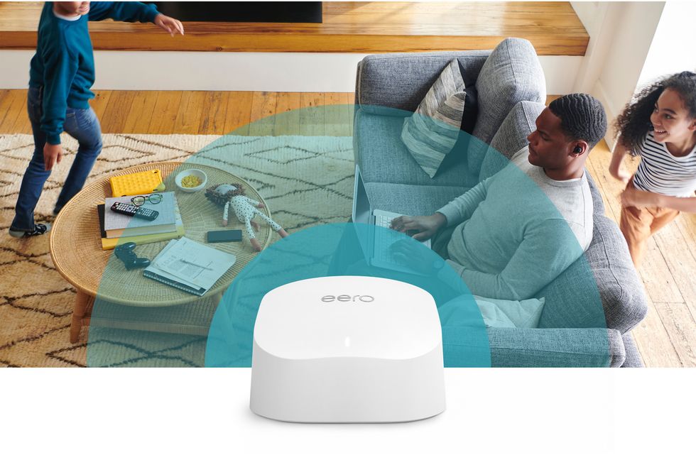 amazon eero 6 router with a family running and laughing in the background