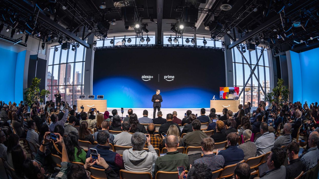 Amazon executive Panos Panay pictured on-stage discussing the latest Amazon products