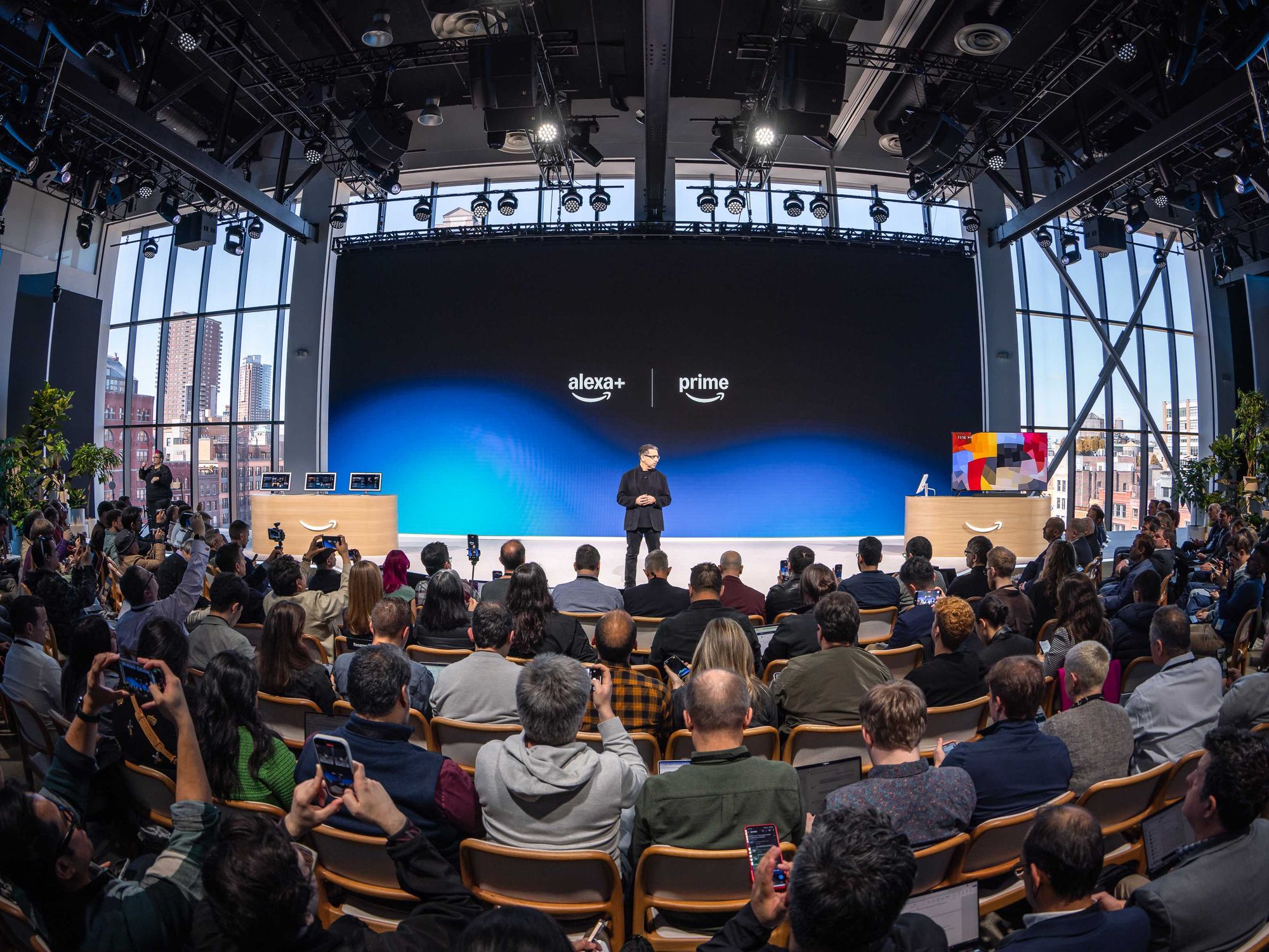Amazon executive Panos Panay pictured on-stage discussing the latest Amazon products