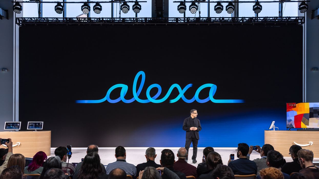 Amazon executive Panos Panay pictured on-stage discussing the latest products and Alexa+