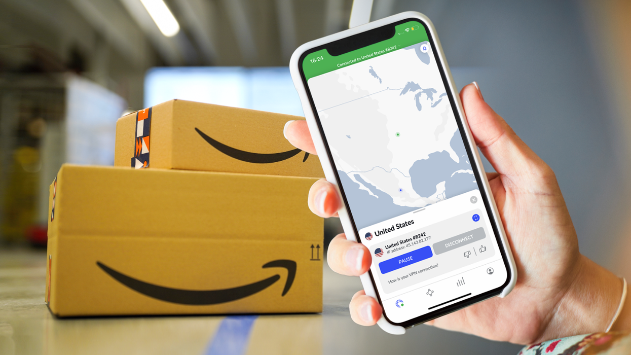 amazon prime boxes in a pile with a hand holding a smartphone with nordvpn in the foreground