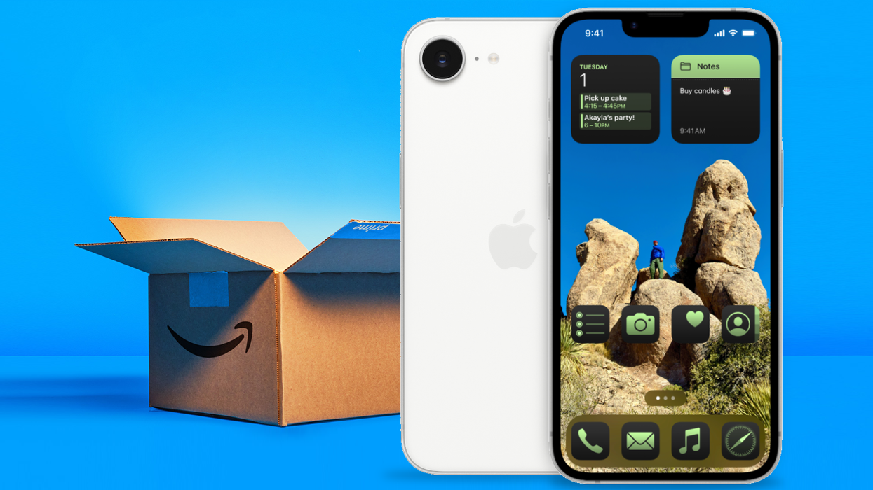 amazon prime shipping box in the background with an iPhone 16e in white and black pictured in the foreground