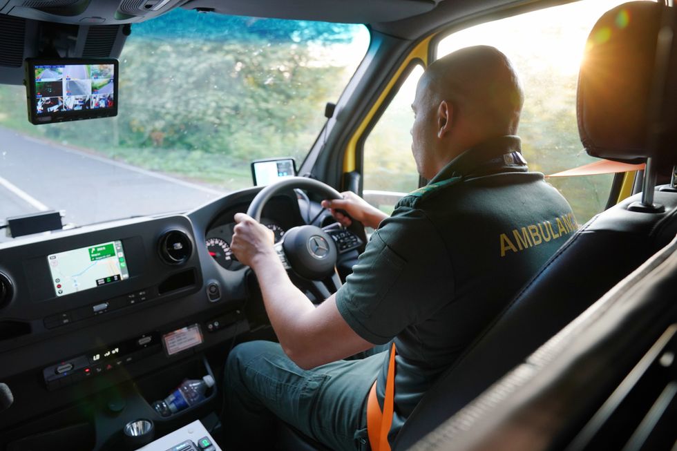 Ambulance Technician drives an ambulance operated by paramedics from the South Thames Retrieval Service (STRS),