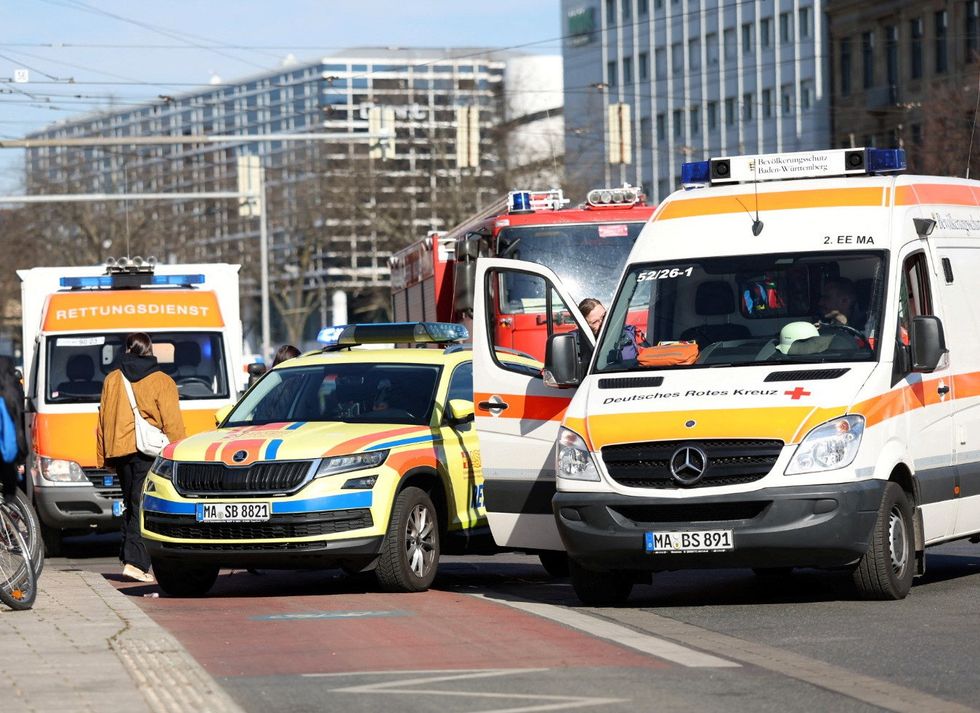 Ambulance vehicles are parked near the scene after a car drove into a crowd\u200b