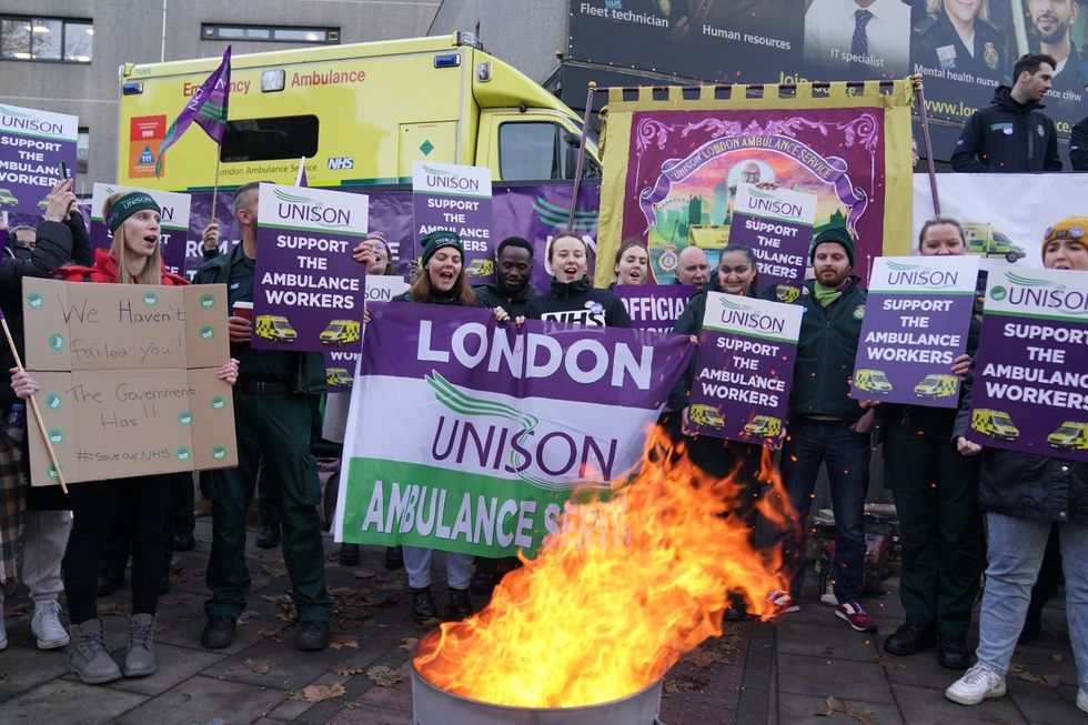 Ambulance workers are striking over a pay and working conditions dispute
