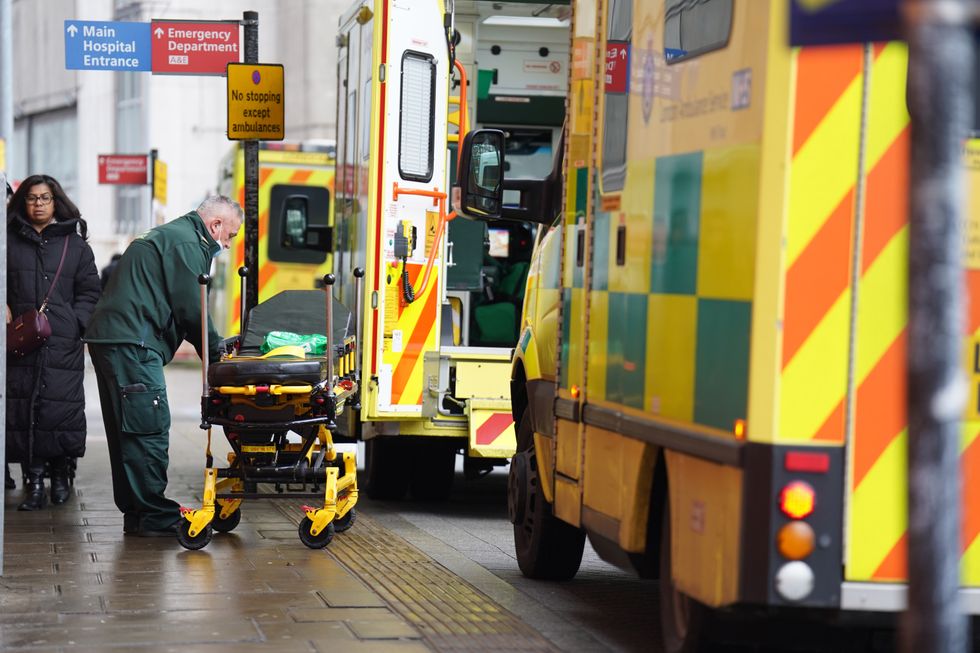 Ambulances outside the Royal London Hospital in east London. Ambulance staff in England and Wales walked out on Wednesday, following action by nurses on Tuesday, with the NHS braced for extra pressure as a knock-on effect of the industrial action. Picture date: Thursday December 22, 2022.