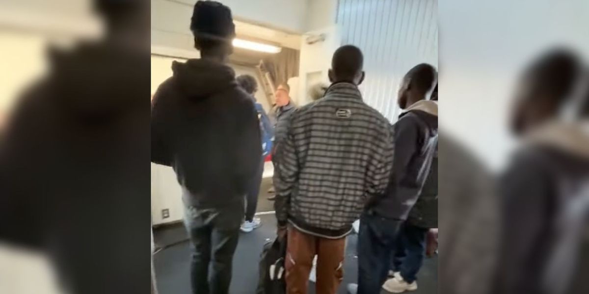 NextImg:American Airlines flight attendants boot eight black men from flight after claiming they were 'smelly'