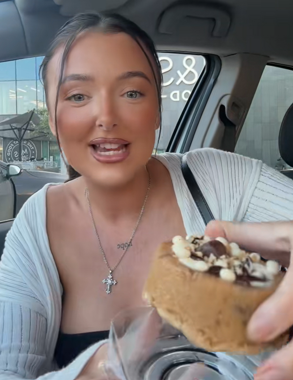 Amy Barry trying one of the cookie cups