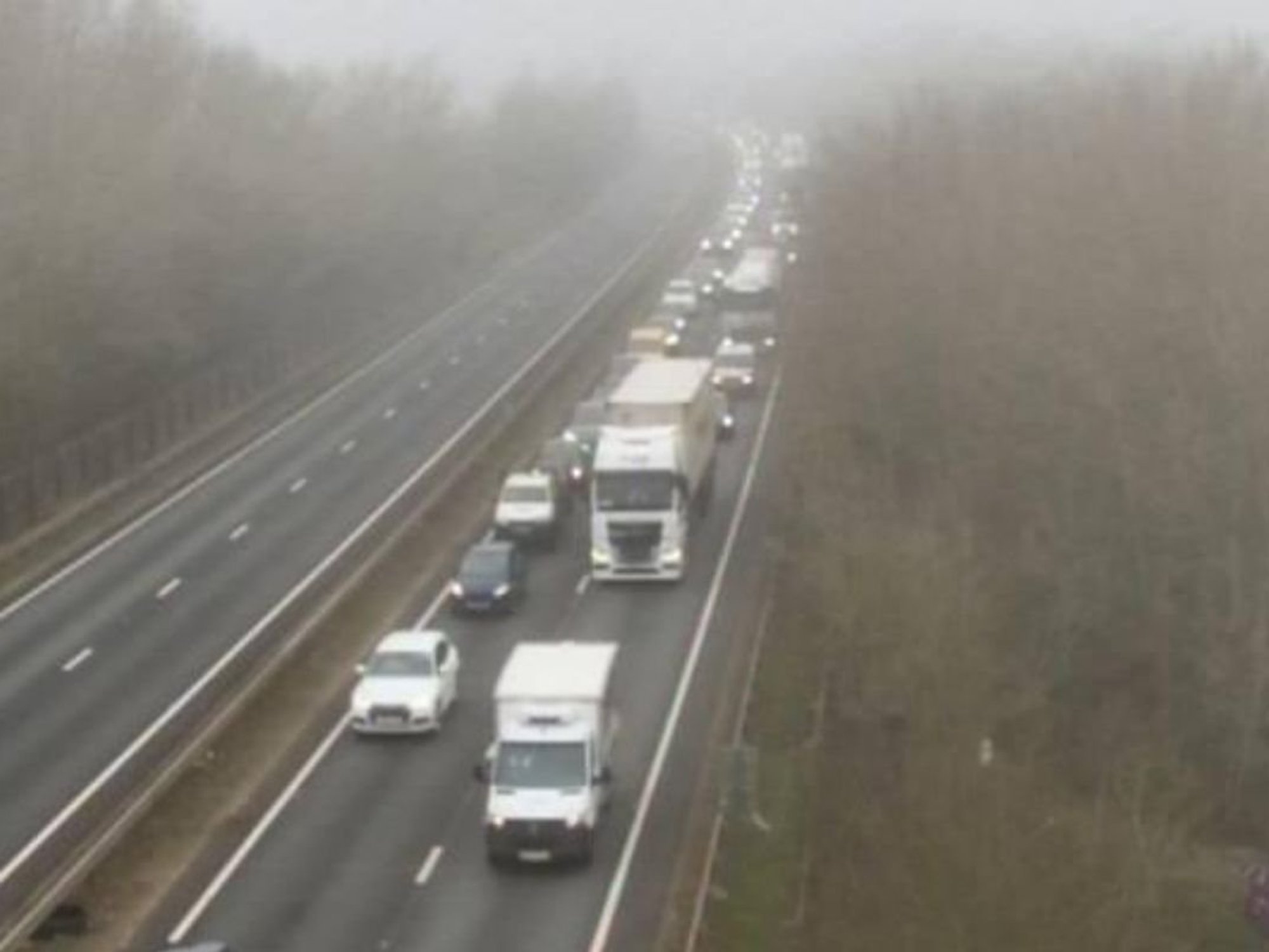 An accident between two HGVs, and a subsequent diesel spillage, has contributed