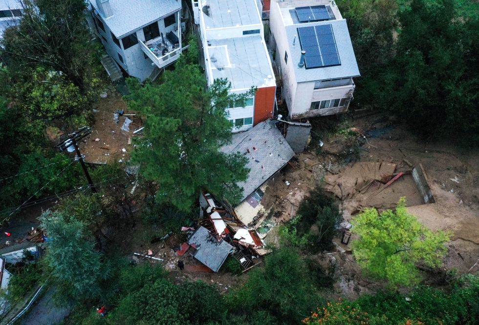 An aerial view of the remains of a home destroyed by a mudslide caused by an ongoing rain storm in Los Angeles, California,