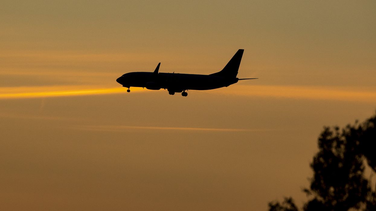 An aeroplane travelling through the sky