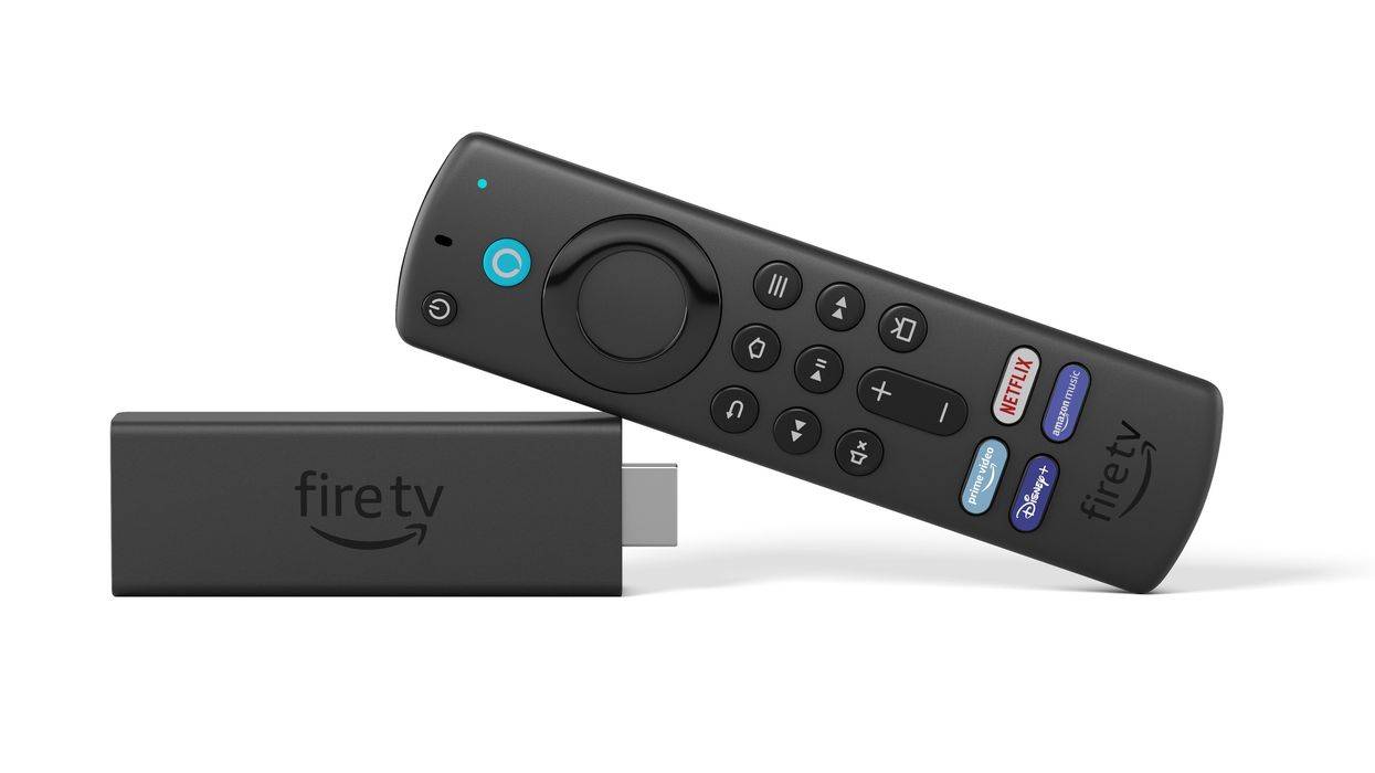 an amazon fire tv stick 4k lying on its side
