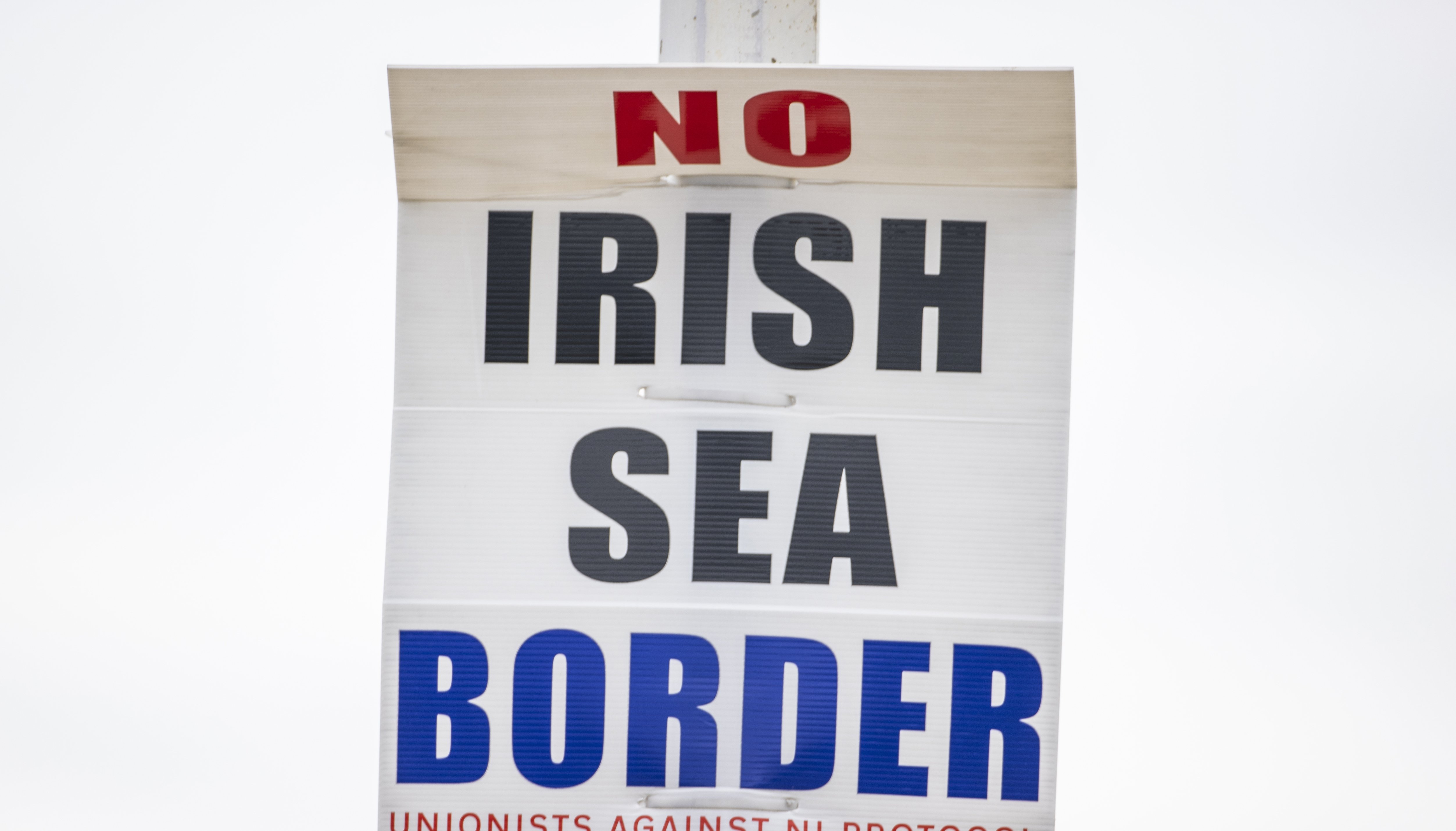 An anti-Northern Ireland Protocol sign close to Larne Port, as a Bill to amend the Northern Ireland Protocol unilaterally was introduced in Parliament yesterday