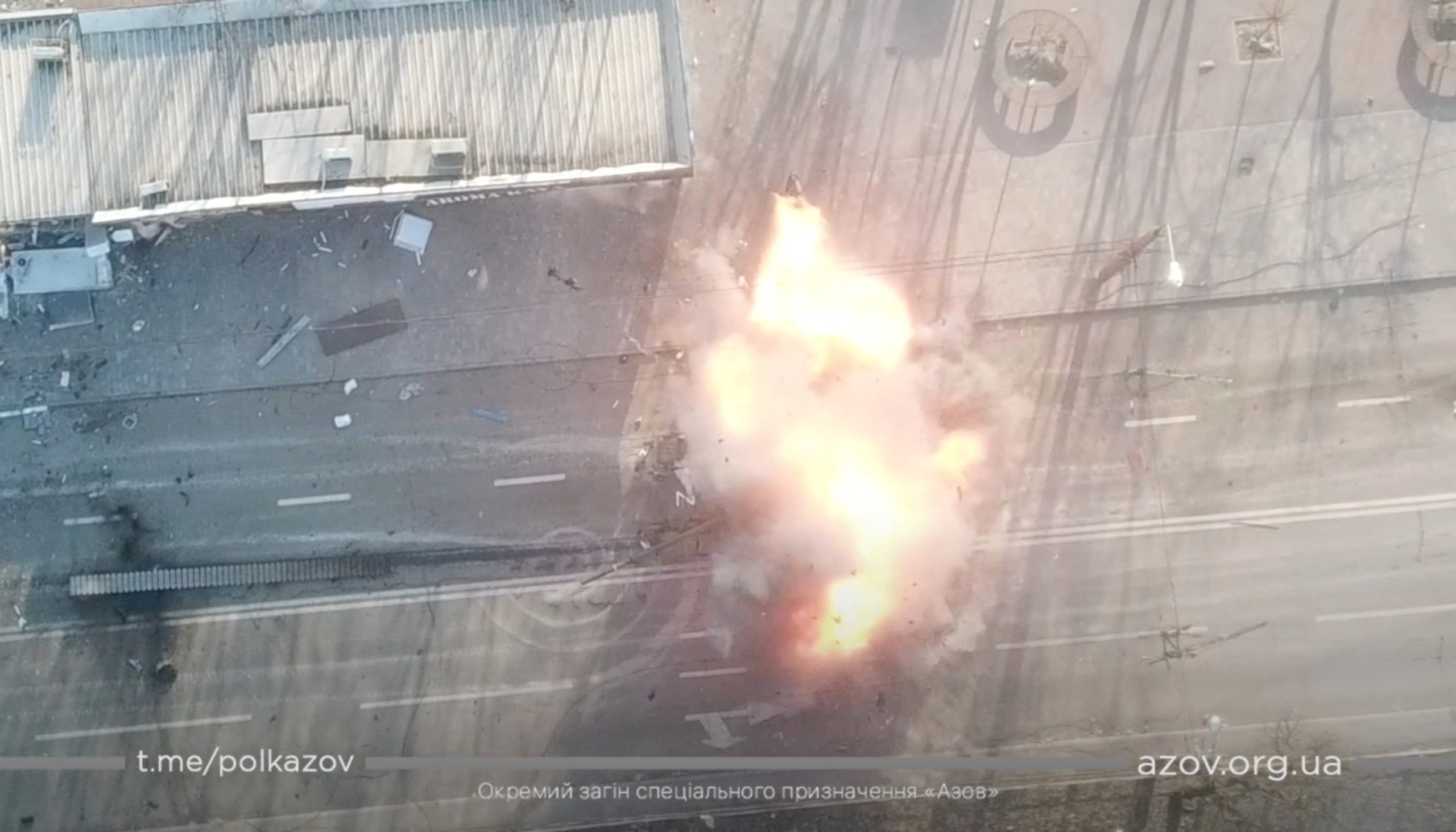 An armoured vehicle with a %22Z%22 marking is attacked, amid Russia's ongoing invasion of Ukraine, in Mariupol.