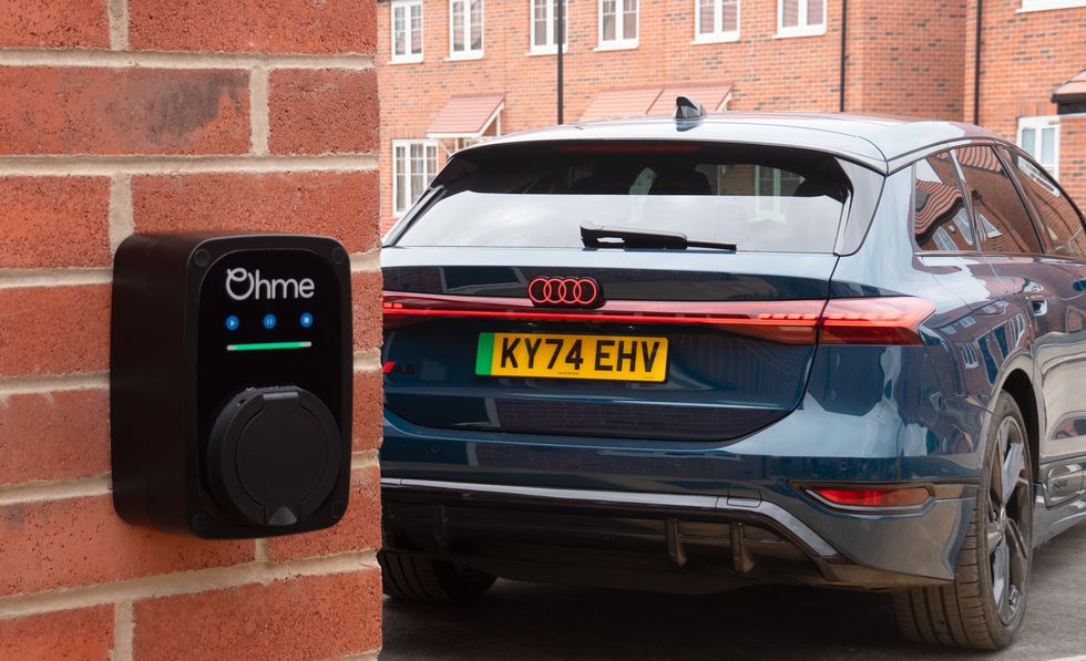 An Audi electric vehicle charging with an Ohme home charger