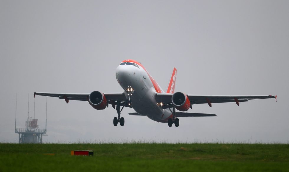 An easyJet plane landing at Liverpool John Lennon Airport
