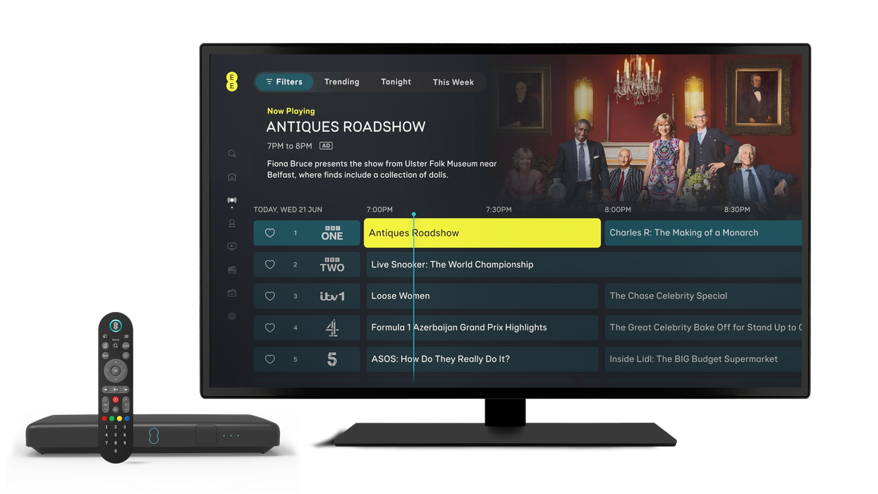 an ee tv pro box pictured with the remote control and a screen showing the menu interface