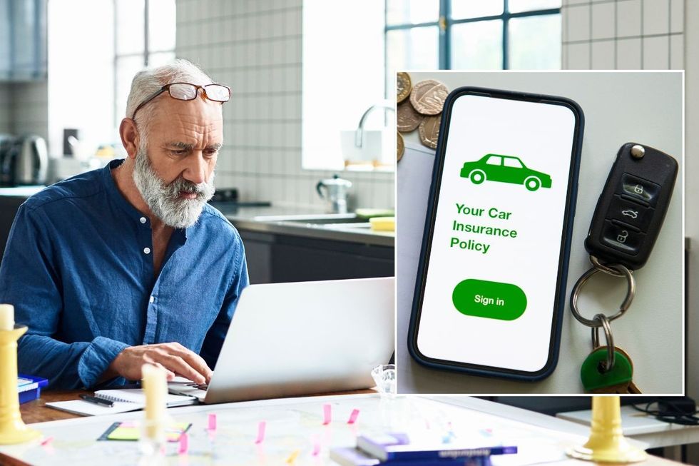 An elderly man looking at a laptop and a car insurance policy