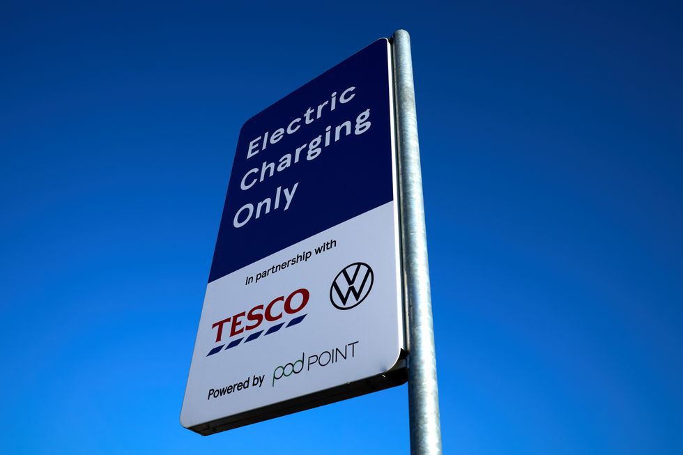 An electric car charging sign at Tesco